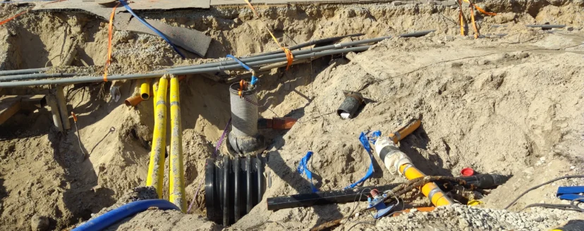 many-multicolored-plastic-pipes-are-in-a-trench-of-2026-01-06-10-58-41-utc